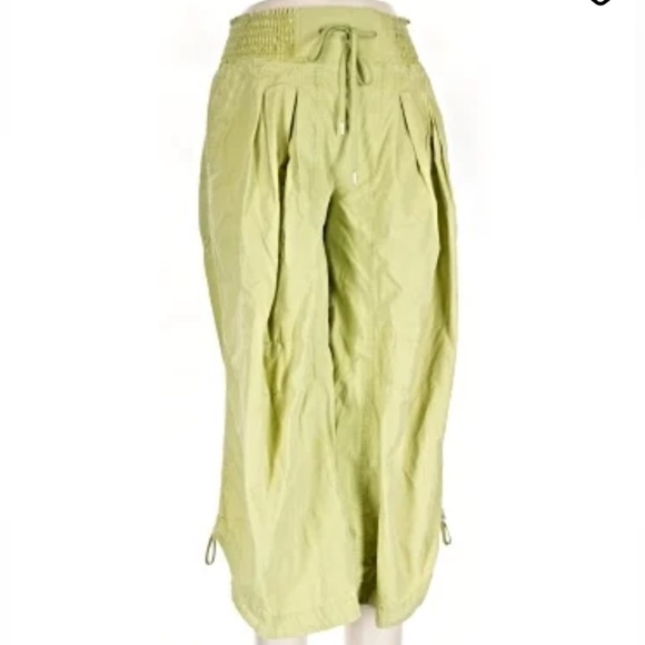 Anthropologie Pants - Anthropologie Green Smocked Waist cropped parachute pants size extra small